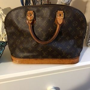 Authentic LV Alma bag.